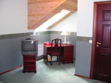 Фото номера Трехместный номер Отель Veskisilla hotel г. Тюри 3