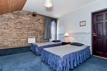 Фото номера Трехместный номер Отель Veskisilla hotel г. Тюри 9